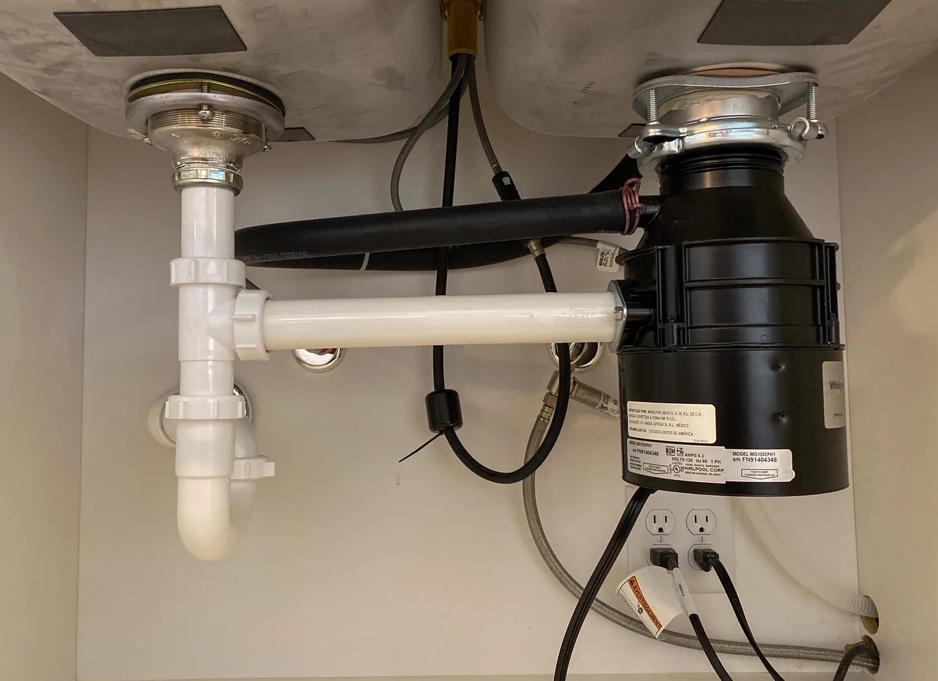 Leaky Garbage Disposal Cleanup in Rowlett, TX